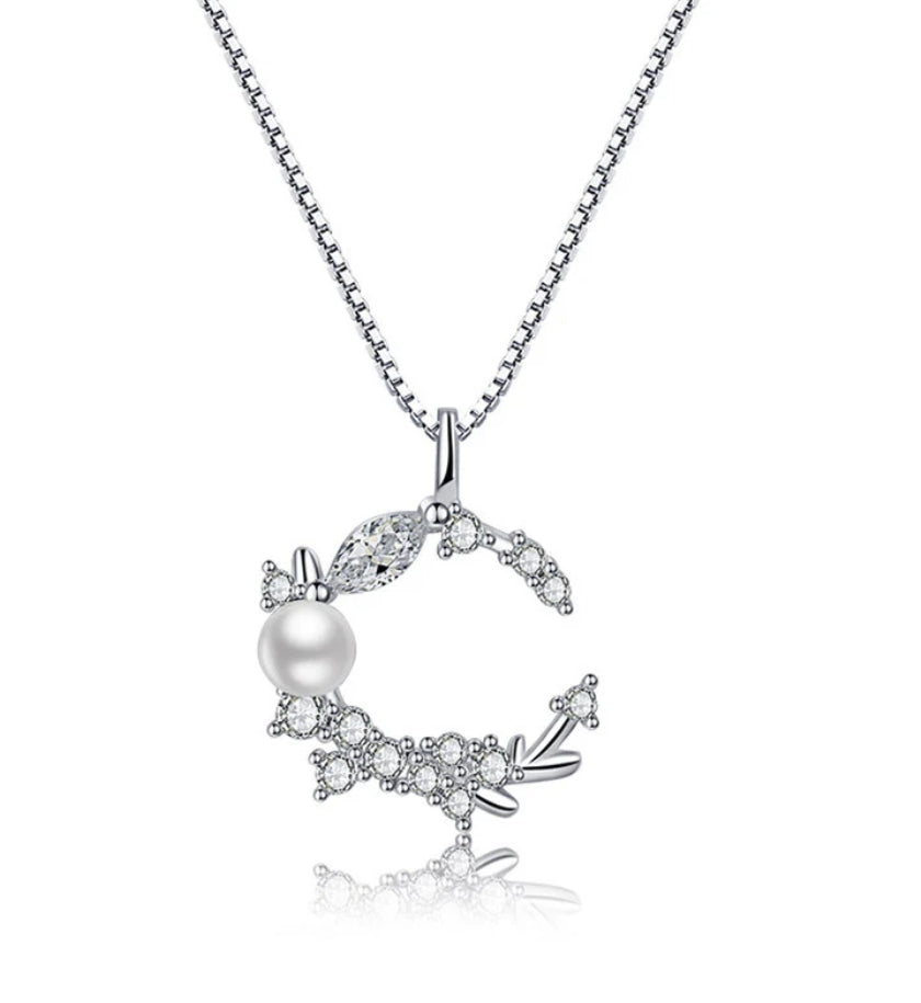 Silver plated moon themed pendant