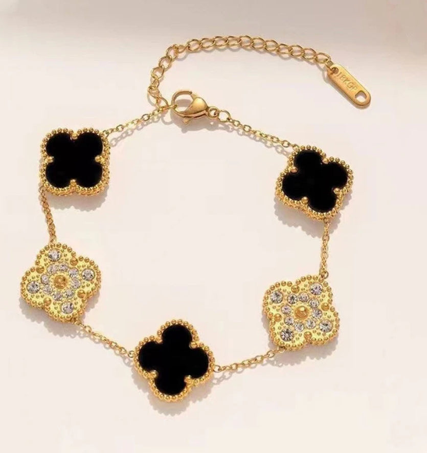 Celebry golden and black clover bracelet