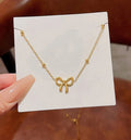 Aura bow necklace