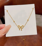 Aura bow necklace