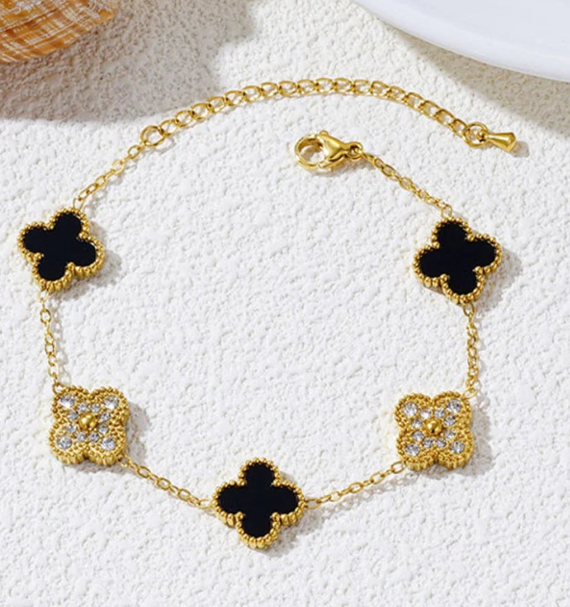 Celebry golden and black clover bracelet
