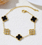Celebry golden and black clover bracelet