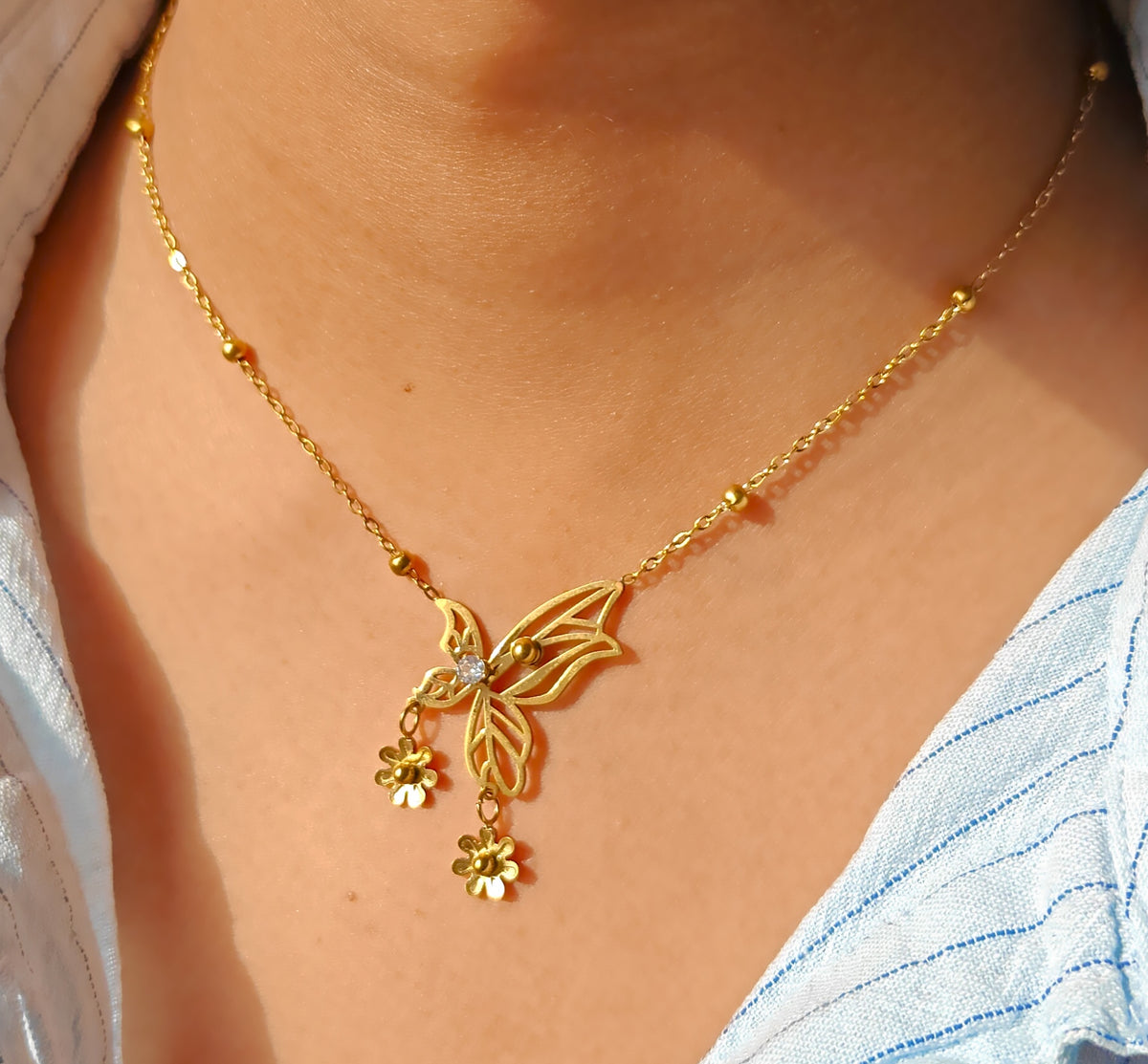 The floral butterfly pendant
