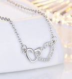 Dual heart pendant